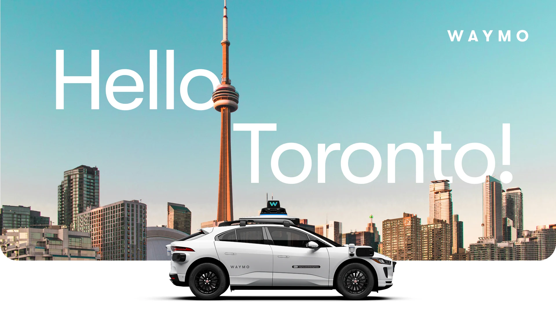 Gráfica oficial de Waymo con un Jaguar I-PACE y la torre CN de Toronto